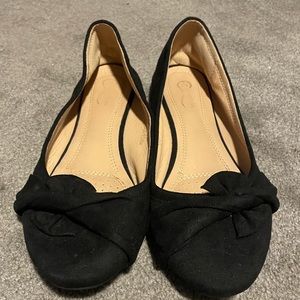 Black suede flats